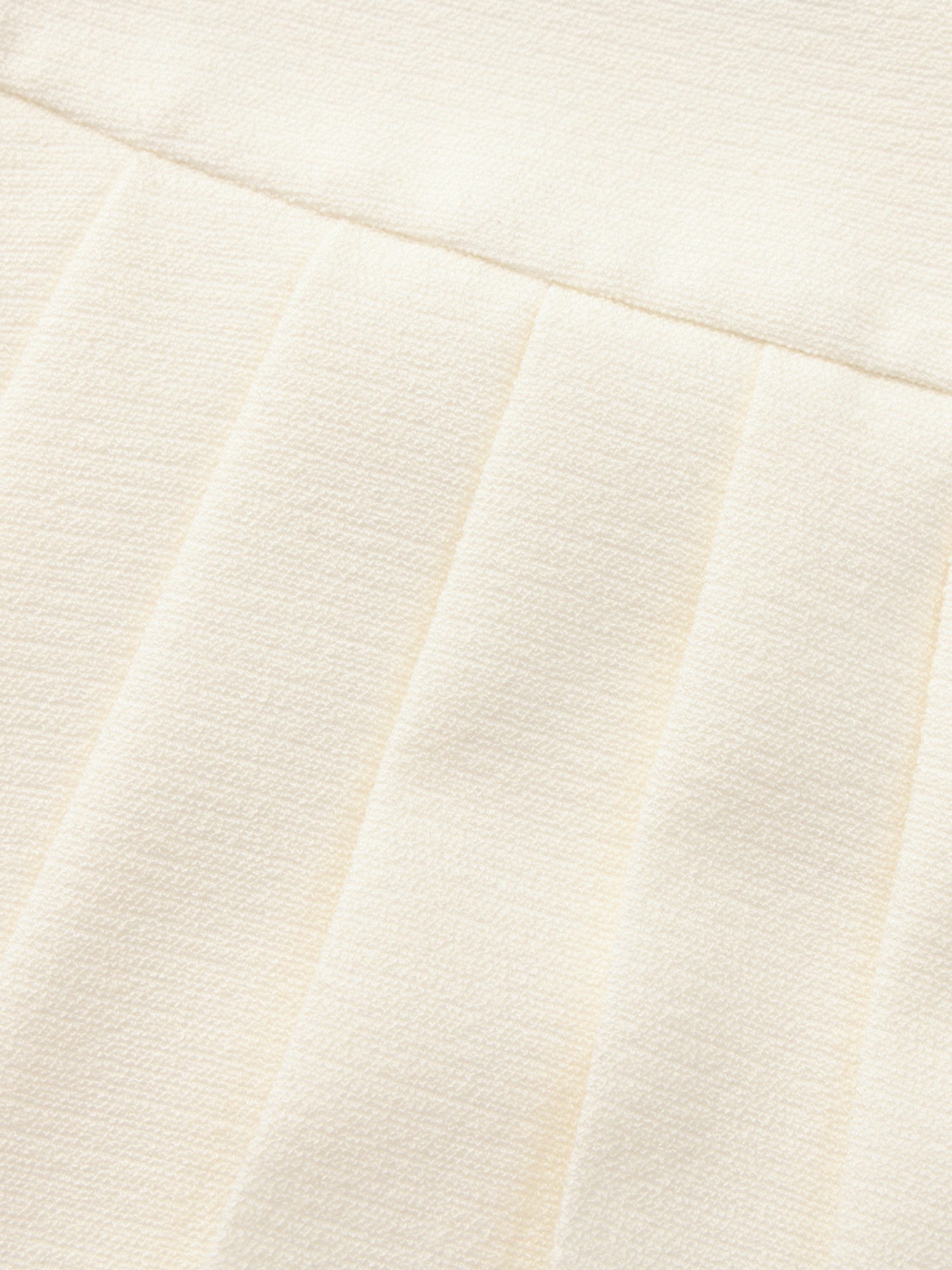 Camille Tailored Pleated White Mini Skirt: White Mini Skirt for Bridal Shower | Nana Jacqueline