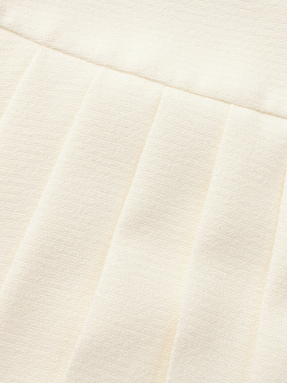 Camille Tailored Pleated White Mini Skirt: White Mini Skirt for Bridal Shower | Nana Jacqueline