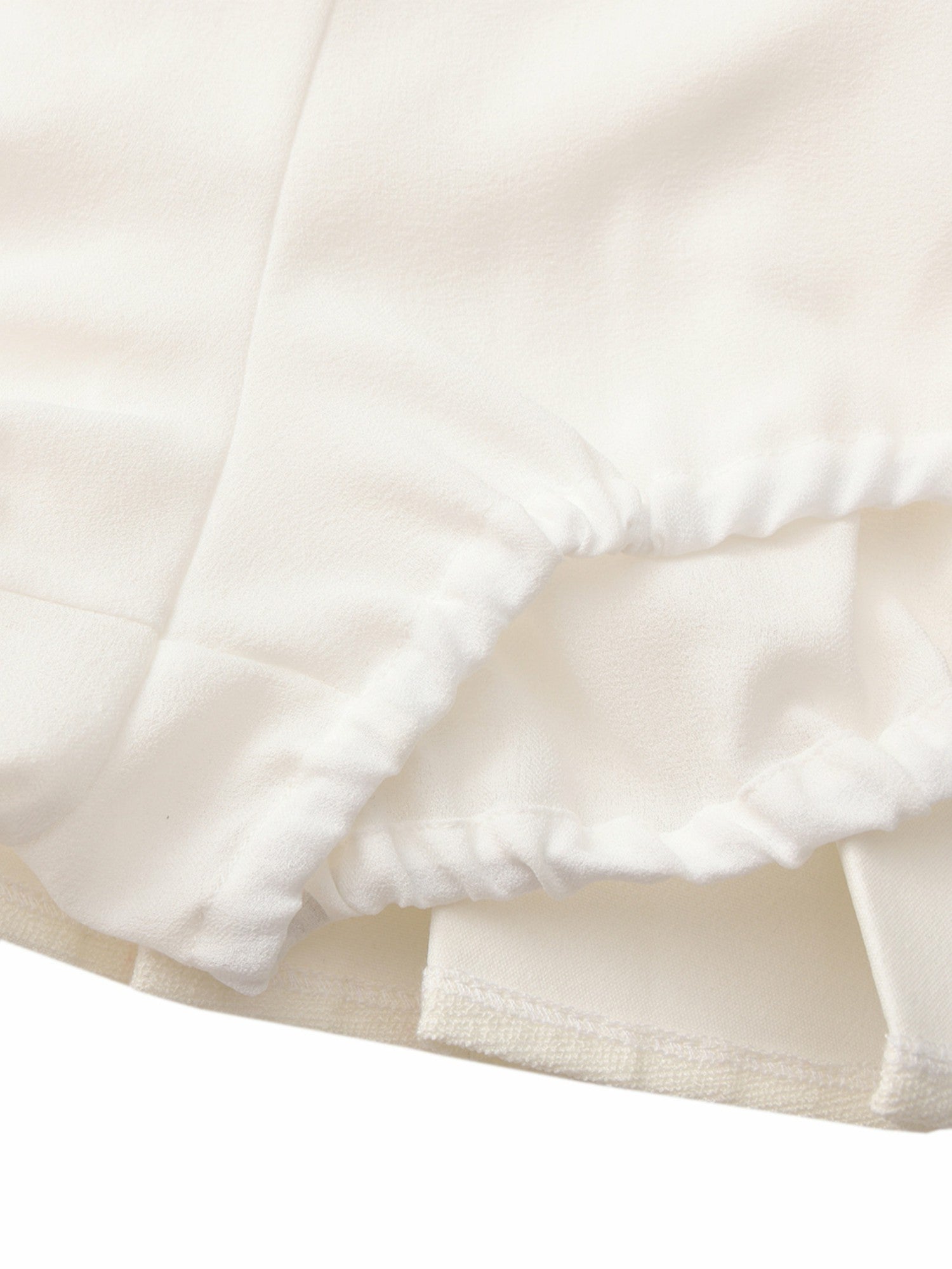 Camille Tailored Pleated White Mini Skirt: White Mini Skirt for Bridal Shower | Nana Jacqueline