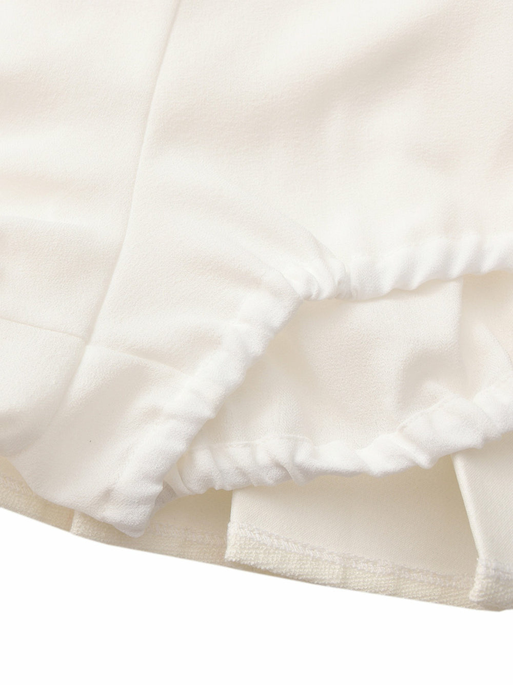 Camille Tailored Pleated White Mini Skirt: White Mini Skirt for Bridal Shower | Nana Jacqueline